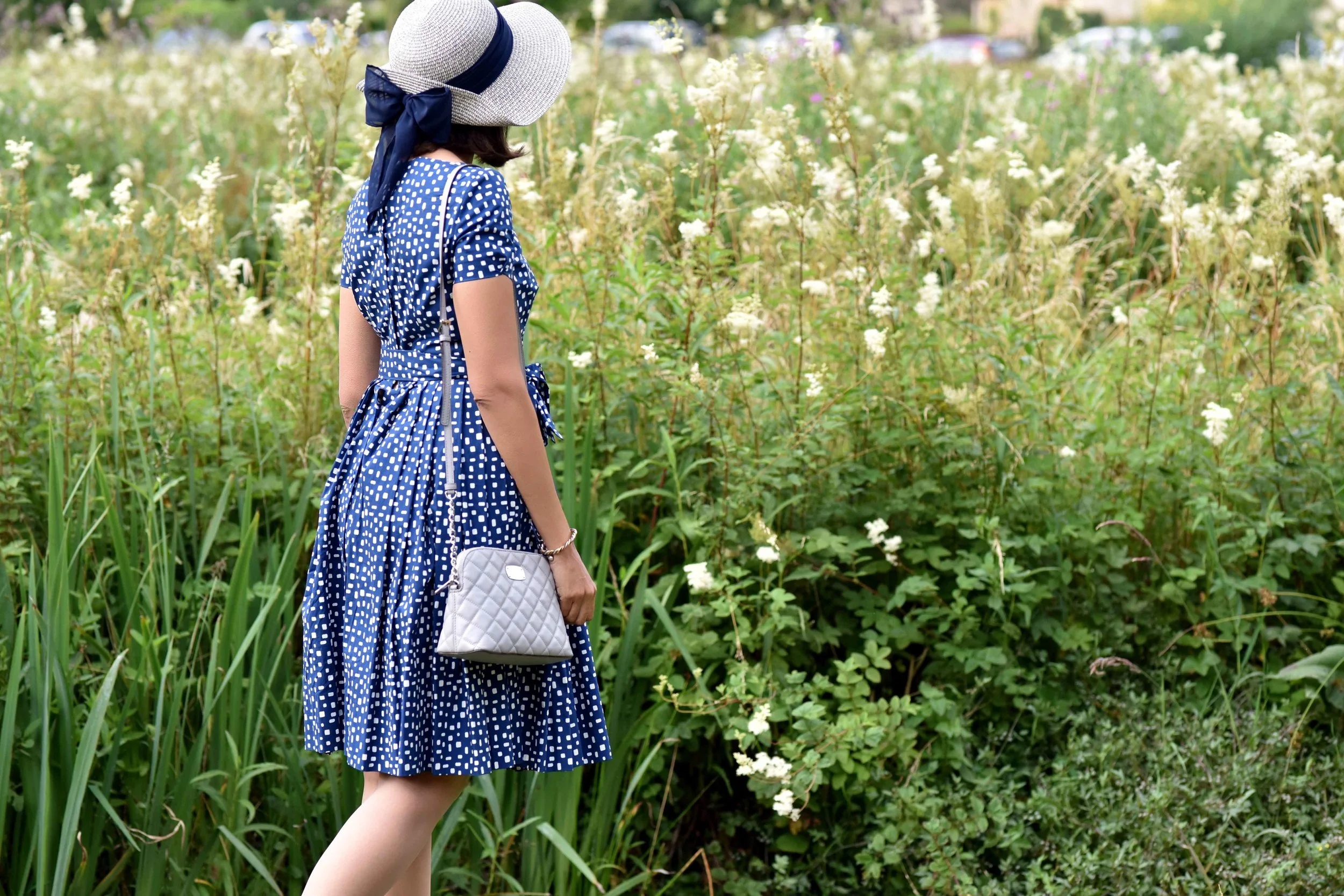 Prada dress, Michael Kors quilted cross body, Bibury, Cotswold, England. Image©thingstodot.com