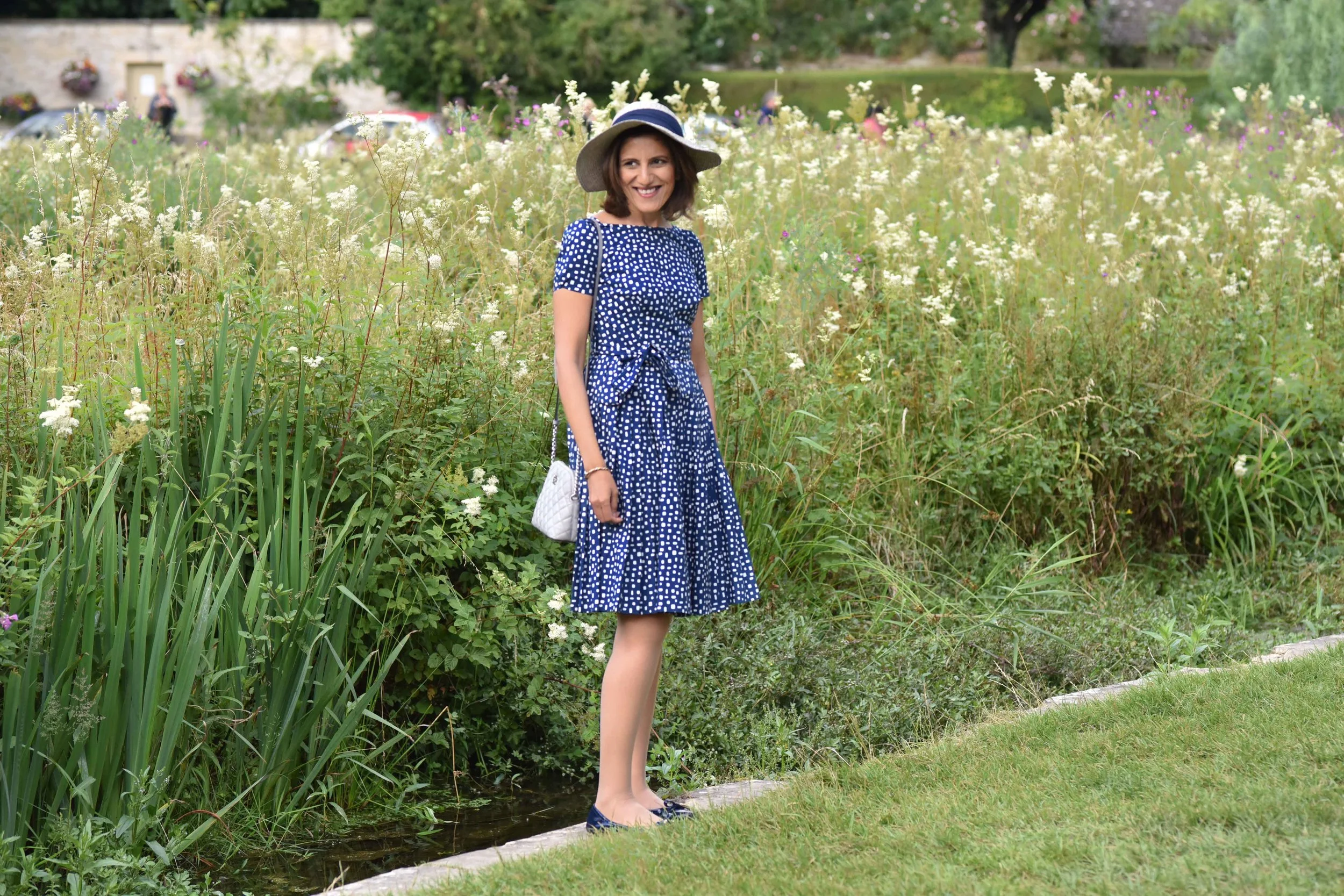 Prada dress, Prada ballet flats, Michael Kors quilted cross body, Bibury, Cotswold, England. Image©thingstodot.com