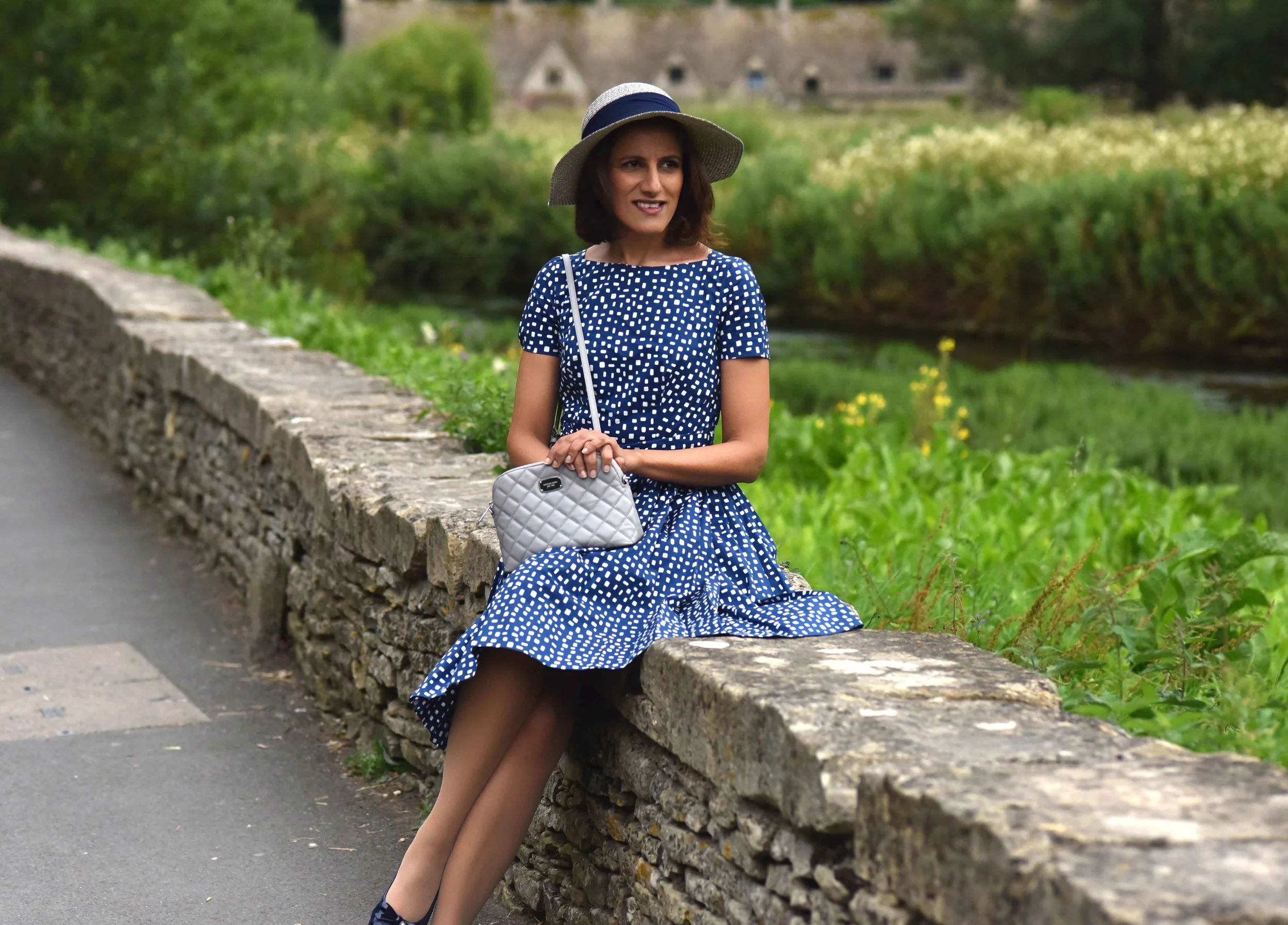Prada dress, Michael Kors quilted cross body, Bibury, Cotswold, England. Image©thingstodot.com