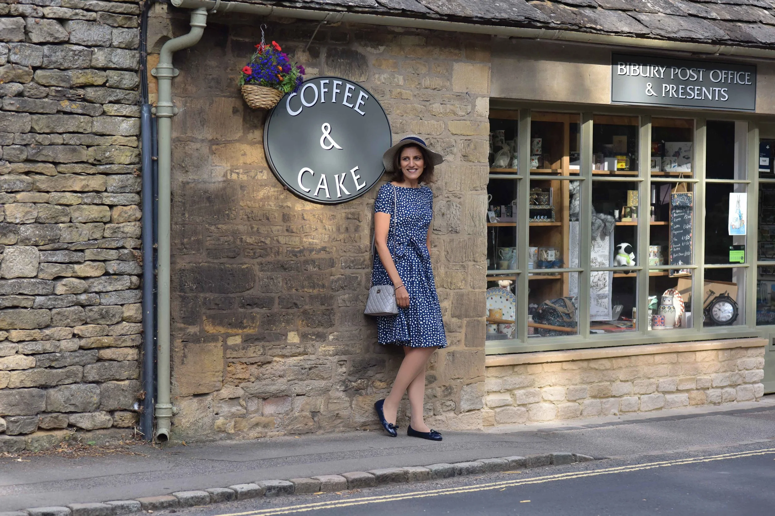 Prada dress, Prada ballet flats, Michael Kors quilted cross body, Bibury, Cotswold, England. Image©thingstodot.com