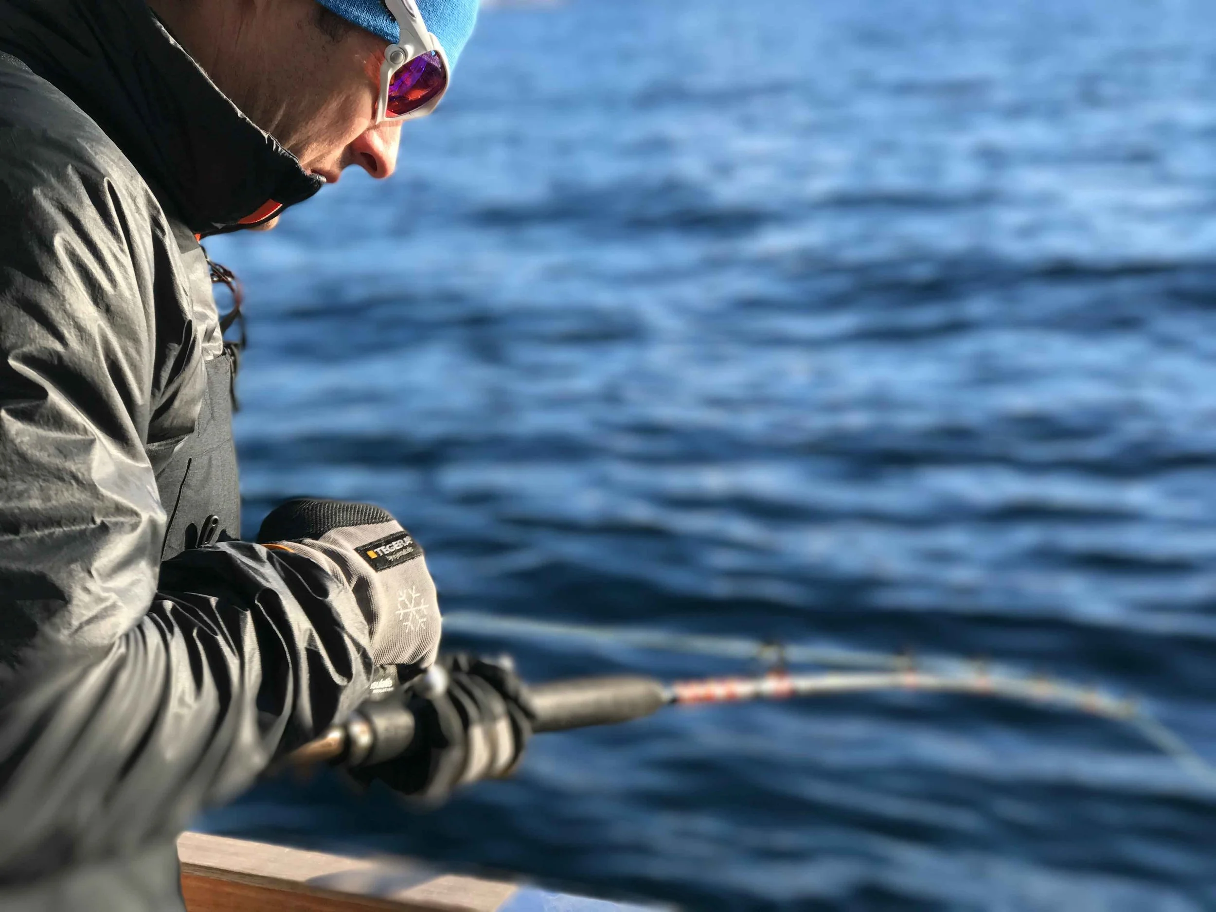 Fishing, Boat cruise, Lyngen fjords, organized by Lyngen Lodge, Arctic Circle, Norway. Image©thingstodot.com