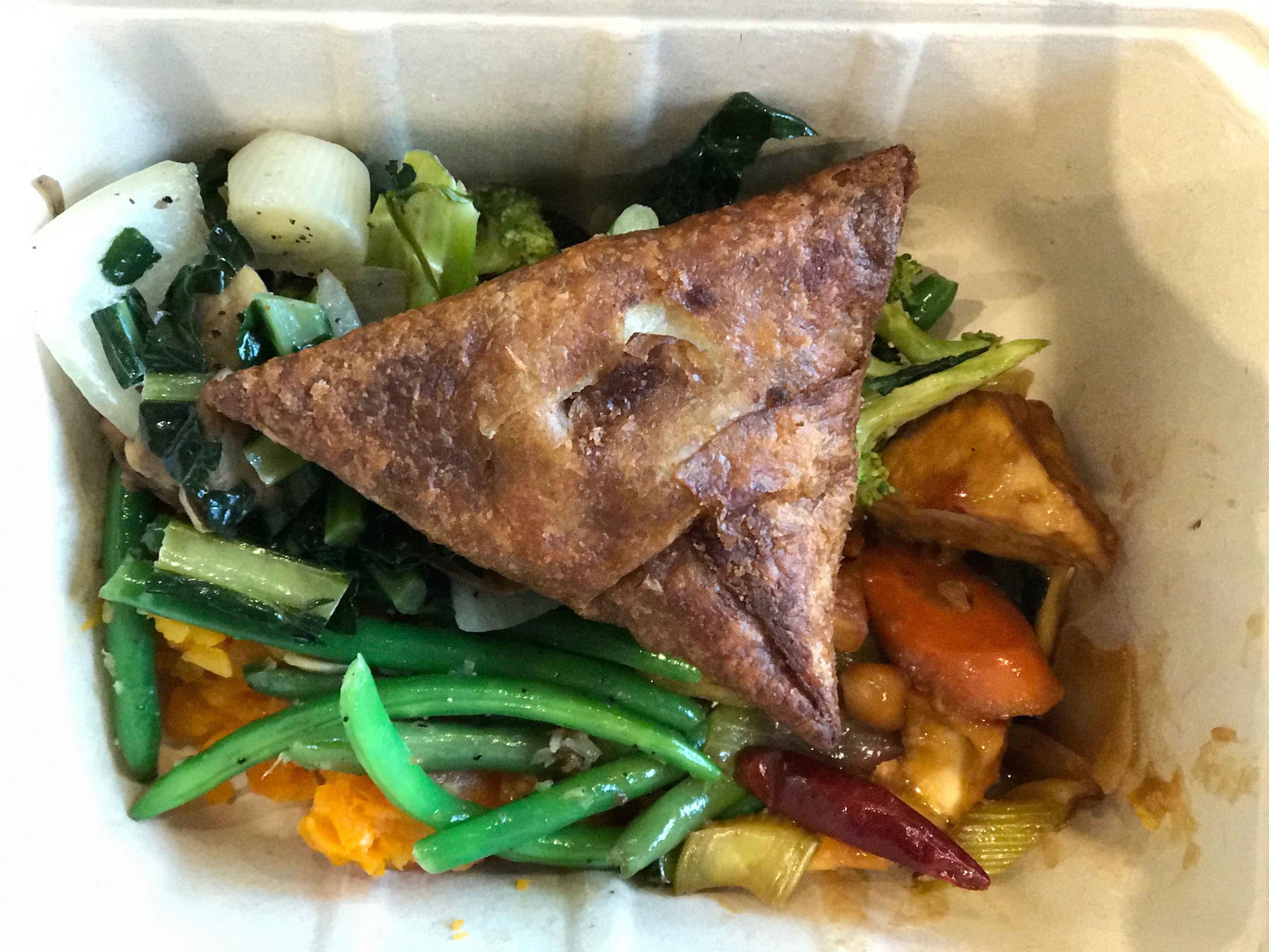 Lunch at Whole Foods, Indian samosa with vegetables. Image©thingstodot.com