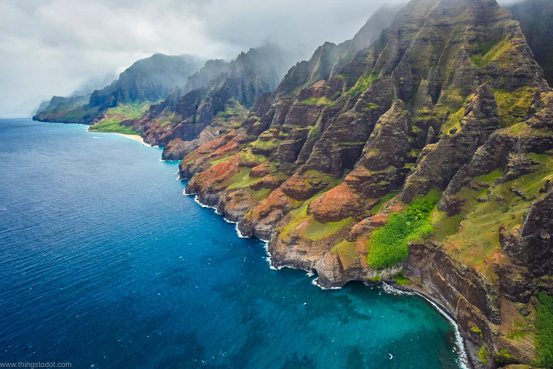 Na Pali Coast, Kauai, Hawaii, aerial view, Jack Harter Doors Off Helicopter Tour. Image©www.thingstodot.com