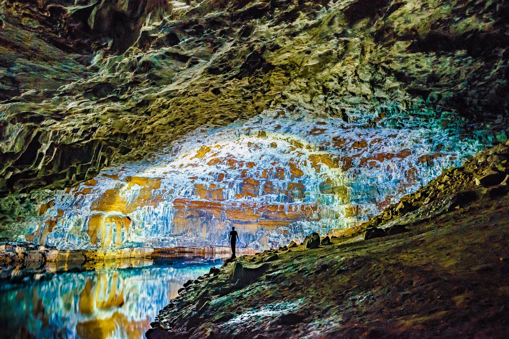 Lave tube caves, Na Pali Coast, Kauai, Hawaii. Photo: Mallory Roe, www.malloryroephoto.com. Image©Mallory Roe. 