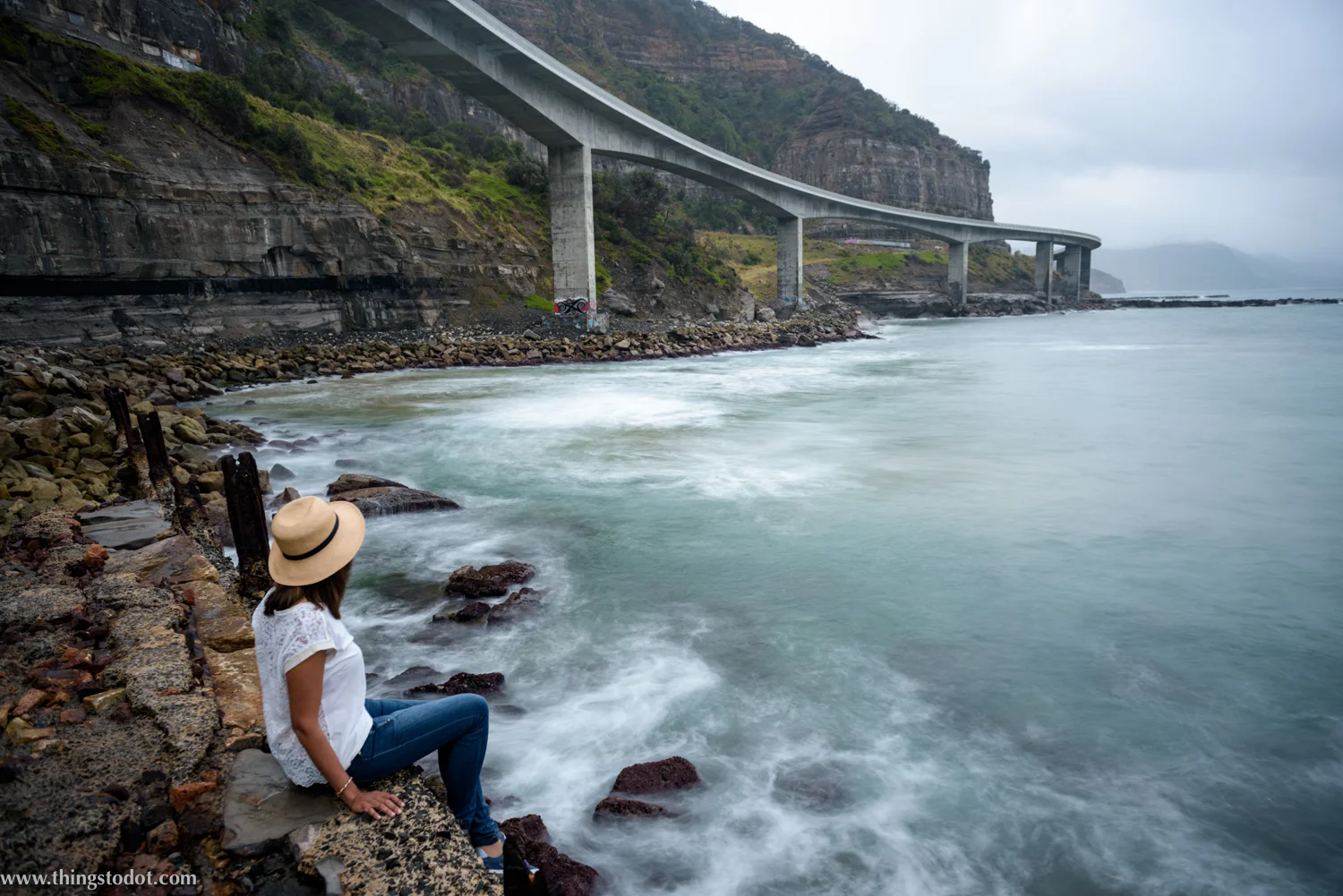 Sea Cliff Bridge, Coalcliff, New South Wales, Australia. Photo: Brad Chilby (http://chilby.com.au). Image©www.thingstodot.com. Clothing: https://www.cream-clothing.com.