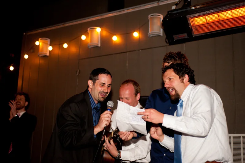 Wedding guests performing song at Axis Cafe