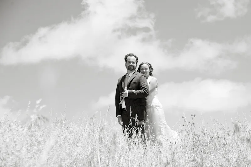 Bride and Groom embracing at Trojan Point on Mt. Tamalpais