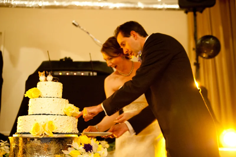 Bride and Groom cutting cake in Piedmont, CA