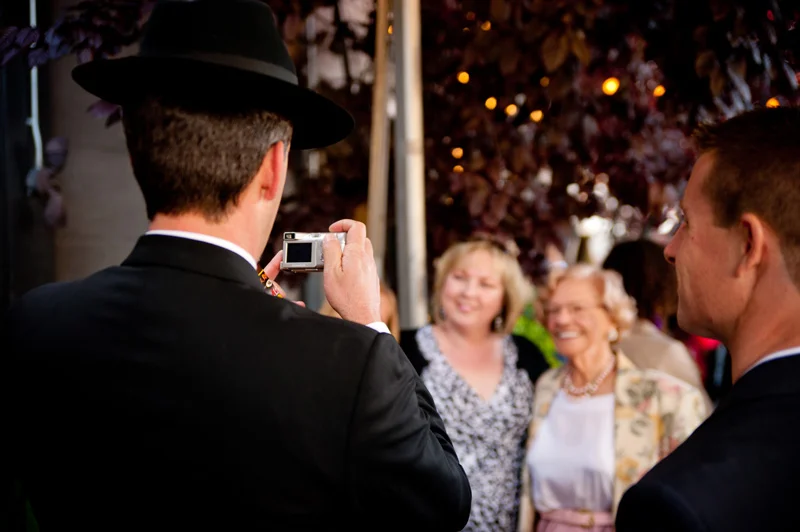 Guests taking photos at Axis Cafe