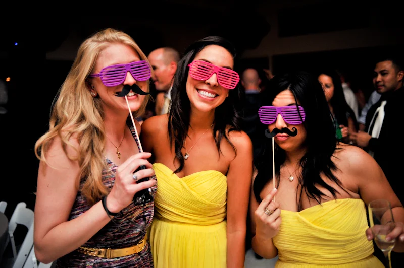 Wedding guests with silly props