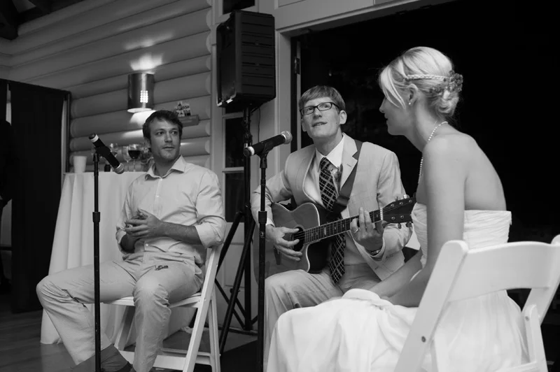 Groom playing guitar for Bride in Oakland, CA