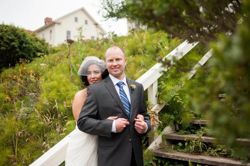 Bride and Groom on wooden stairs