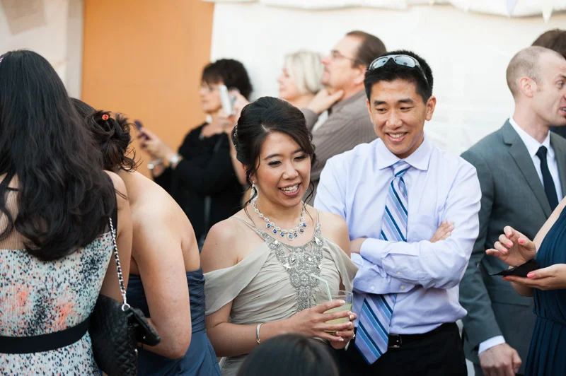 Bride greeting wedding guests