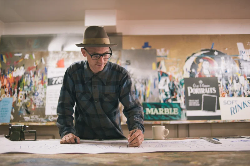 Portrait of Derek at Golden West SIgns