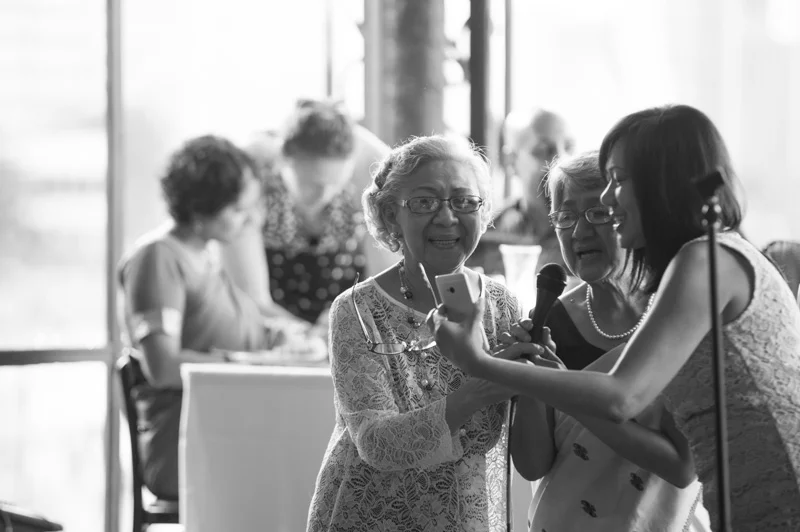 Guests singing at Terrace Room wedding reception