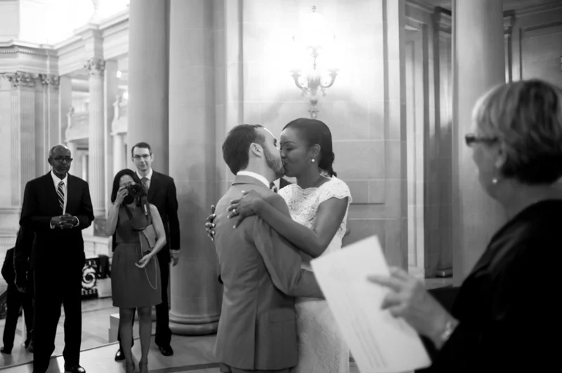Bride and Groom kiss at San Francisco City Hall