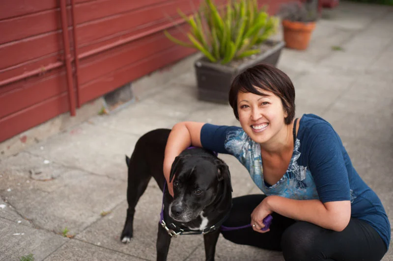 Lifestyle portrait of woman with dog