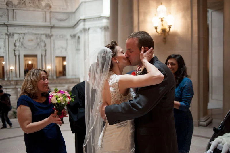 Bride and Groom kiss at San Francisco City Hall Wedding