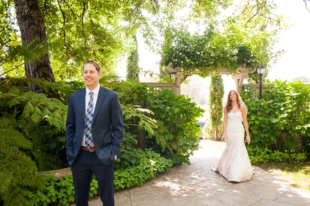 Bride and groom during first look at the Vine Hill House