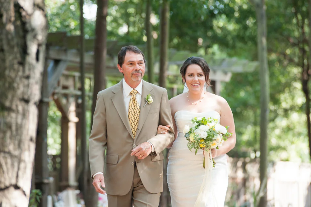 Father walking bride down the aisle at Scout Rock in oakland