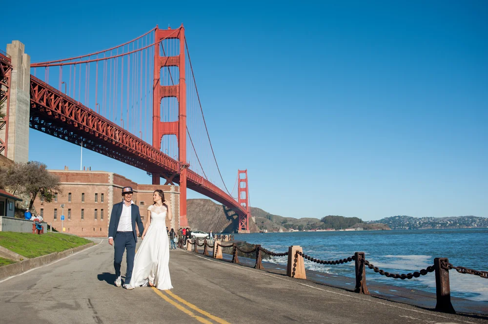 Young married couple under the golden gate bridge