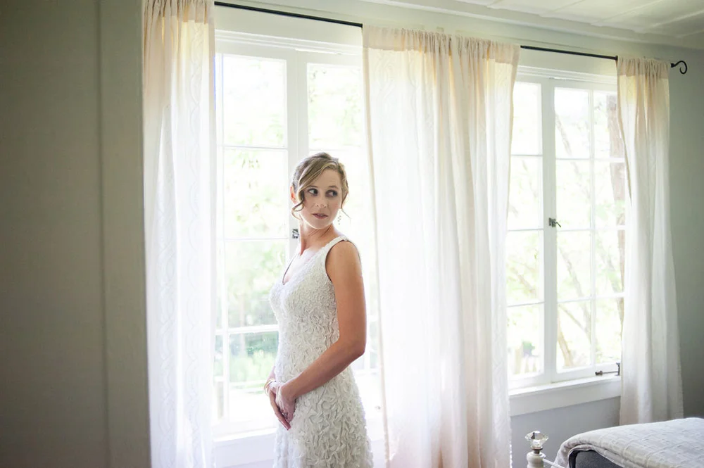Natural light portrait of bride in wedding dress at Dawn Ranch