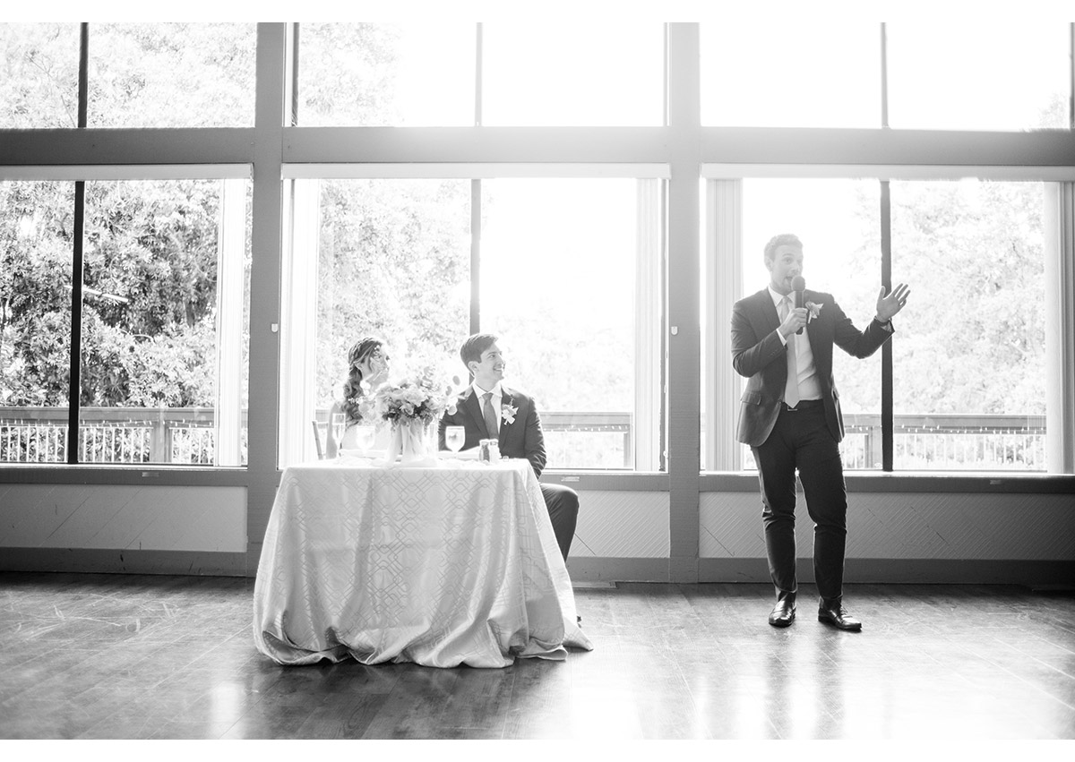 Best man giving toast during wedding reception at Heather Farm