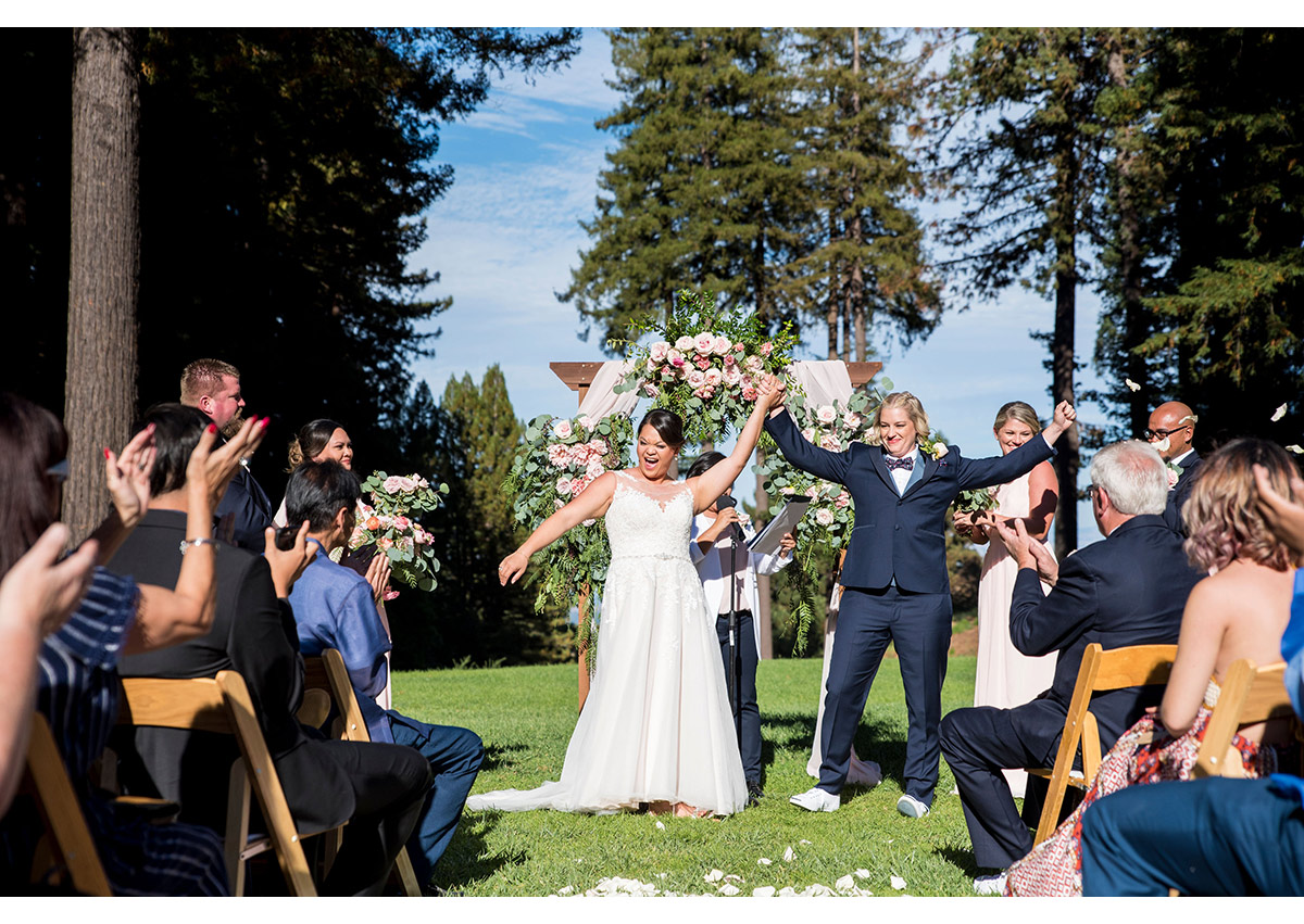 Brides excited as they walk down the aisle