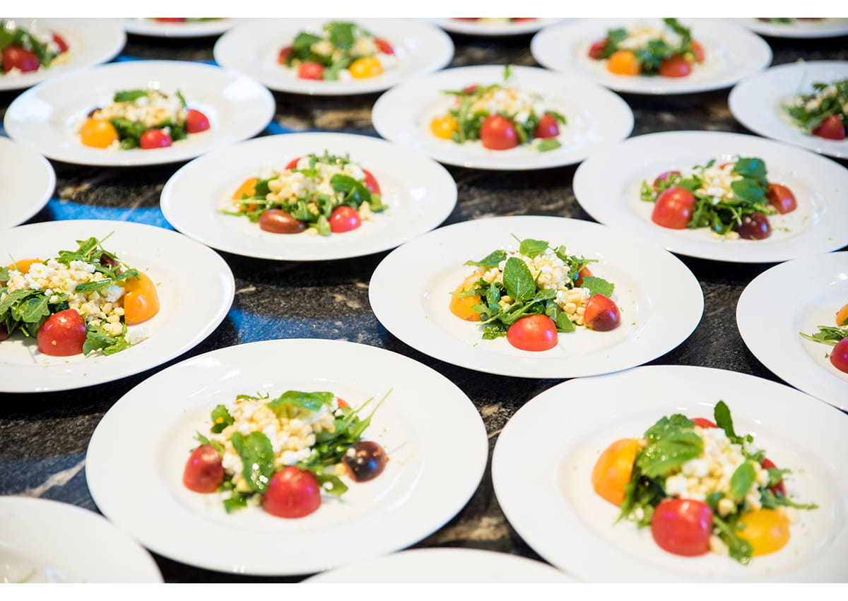 Plates of salad ready to be served