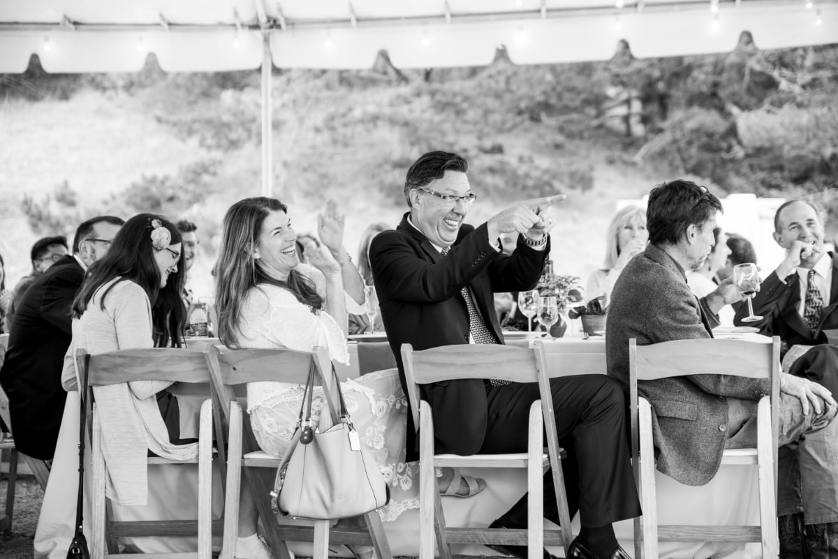 Wedding guests reacting to toasts
