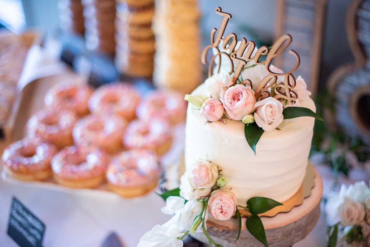Wedding cake and donuts at reception in Walnut Creek