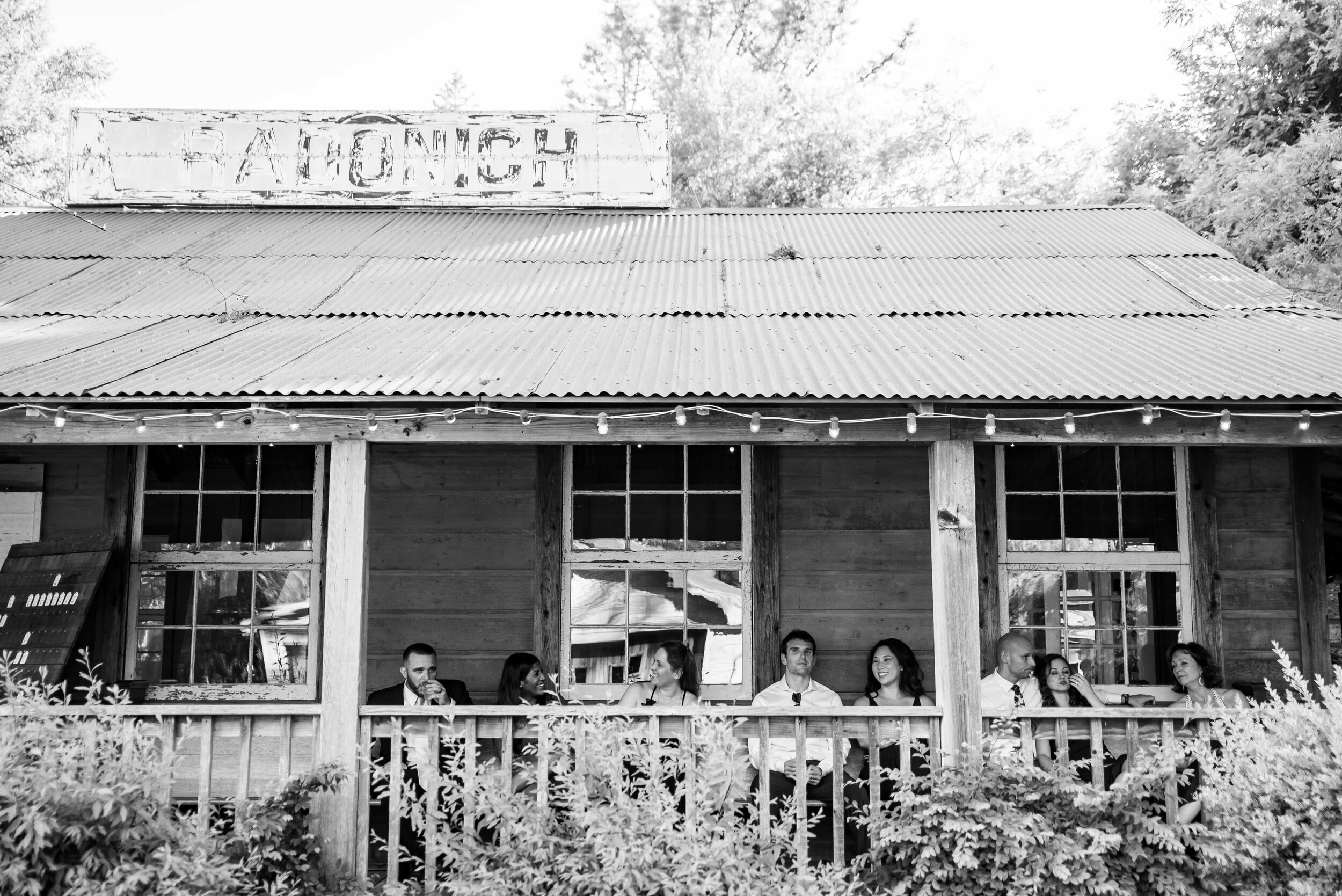 Black and white of wedding guests at Radonich Ranch