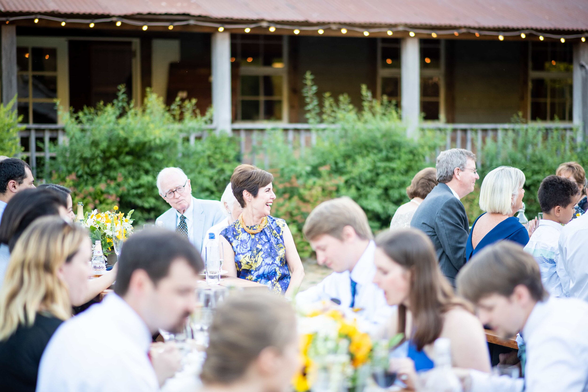 Wedding guests listening to toasts