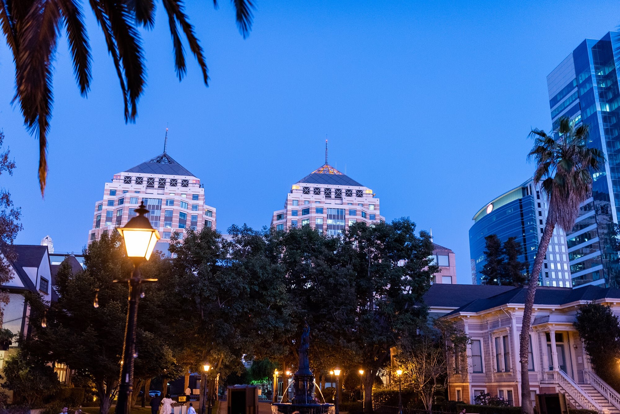 Oakland city skyline at dusk as seen from Preservation Park