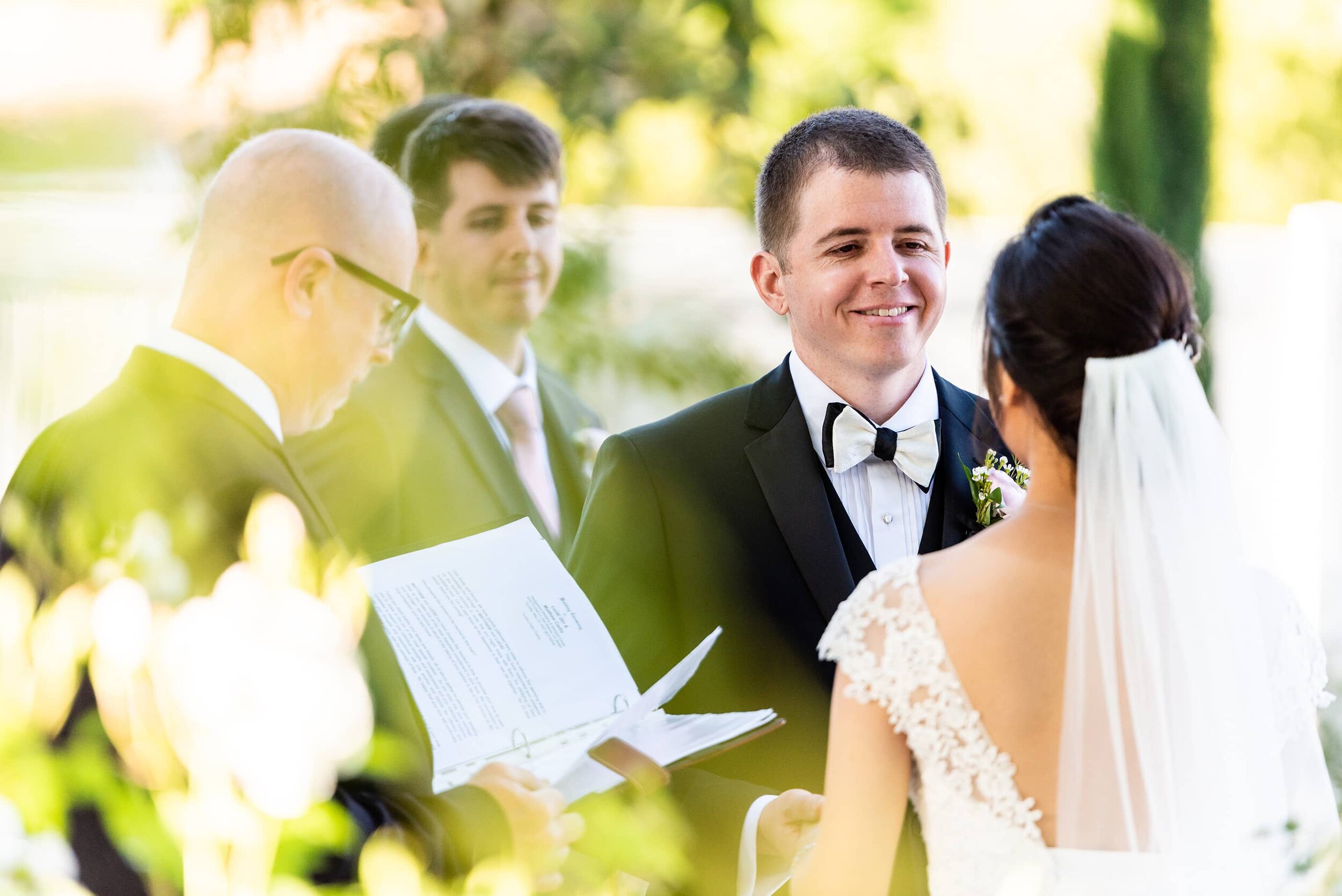 Groom looking at Bride during wedding ceremony