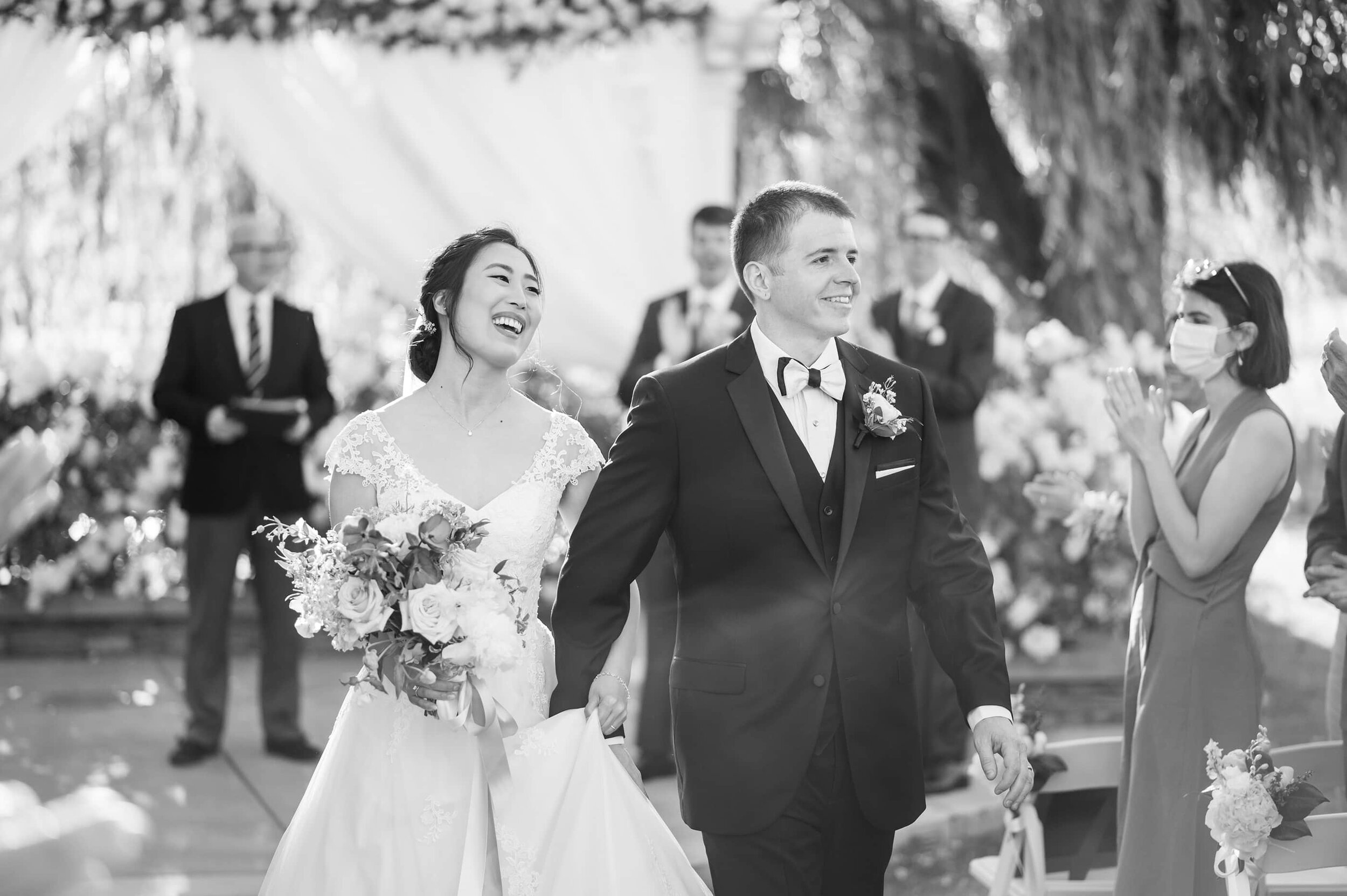 Black and white photo of happy bride and groom