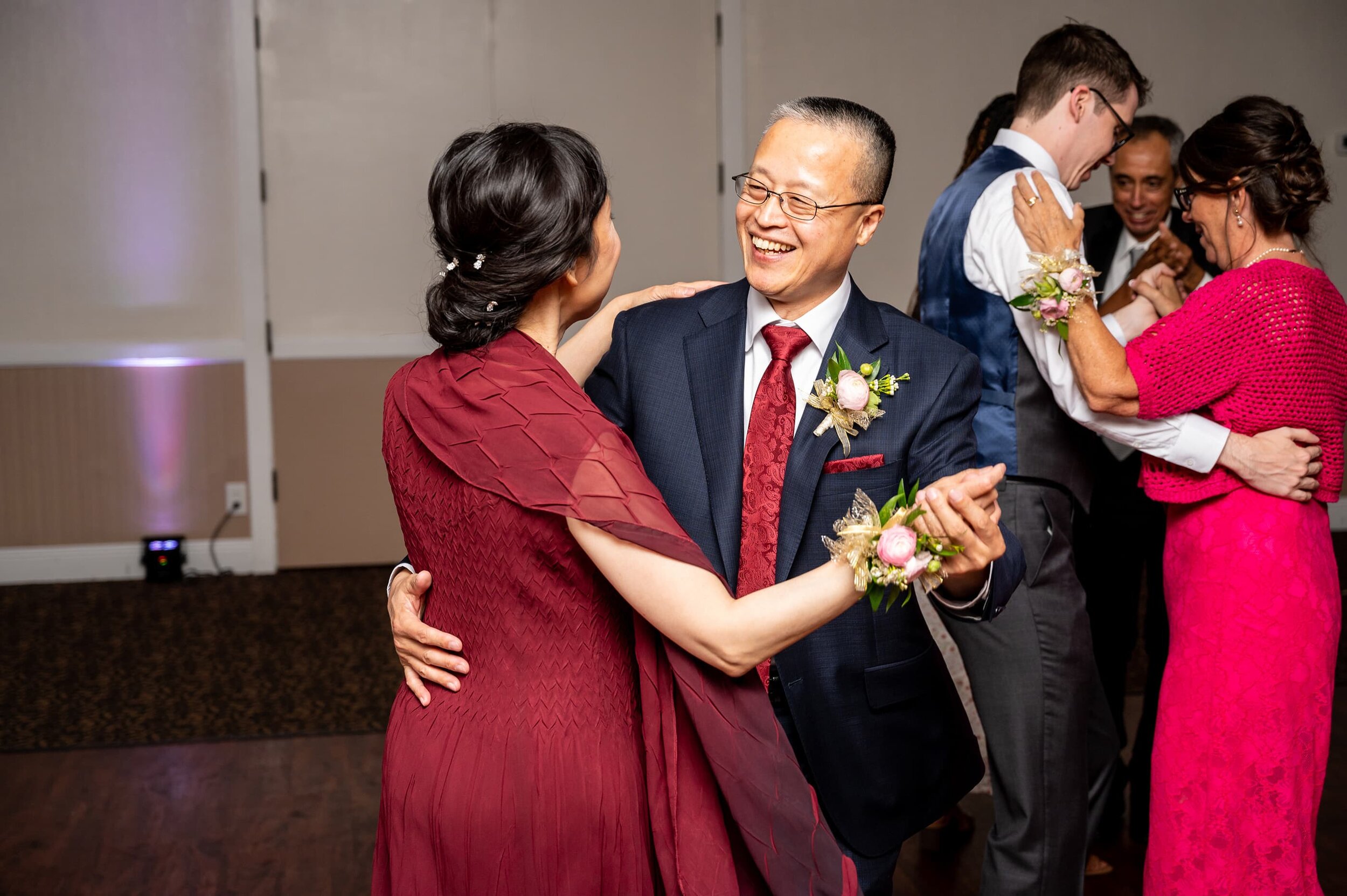 Bride's parents dancing during wedding reception