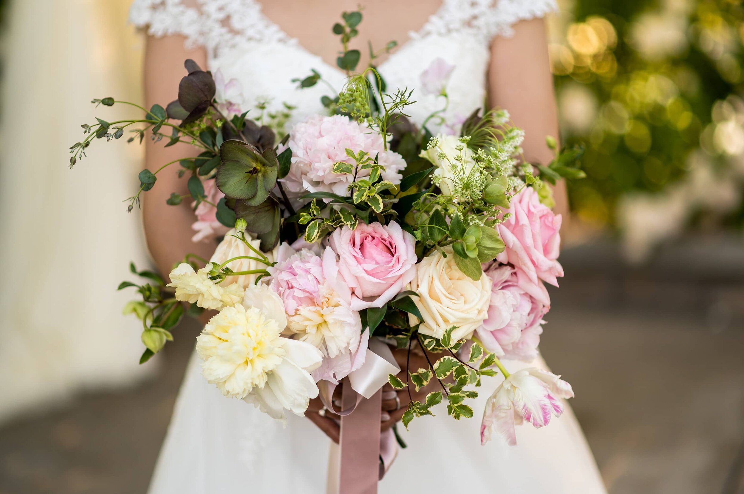 Detail of bride holding wedding bouquet