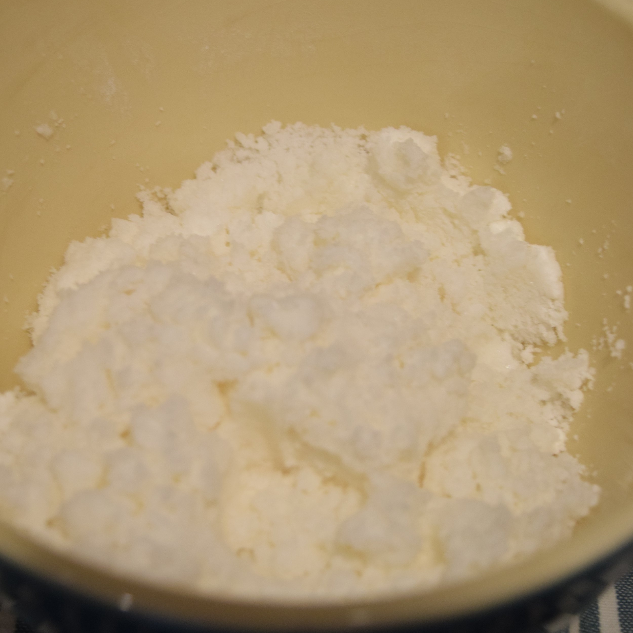 Pour wet ingredients into dry ingredients and quickly mix with hands