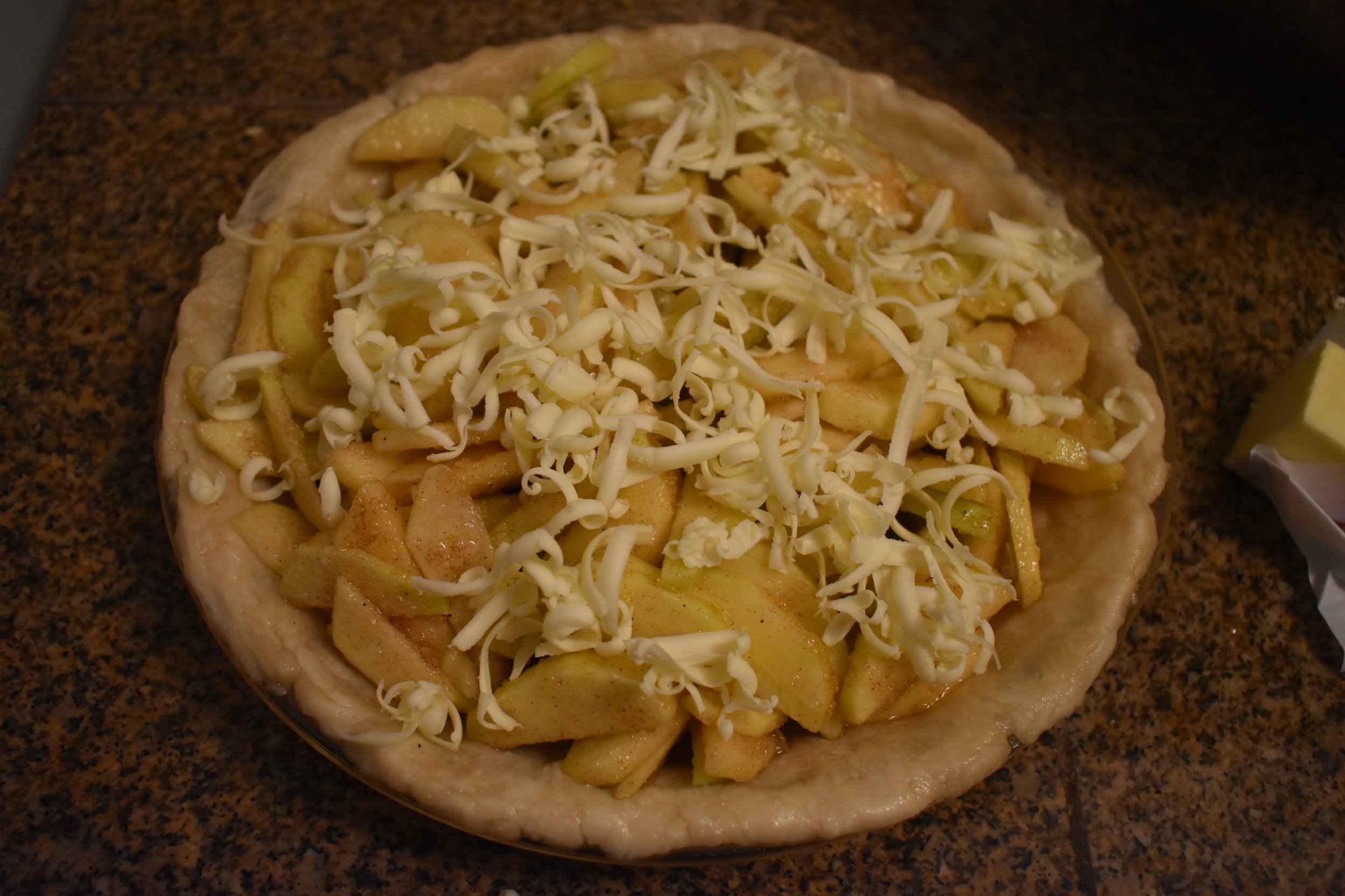  Pour mixture into pie shell and cut or shred butter on the top 