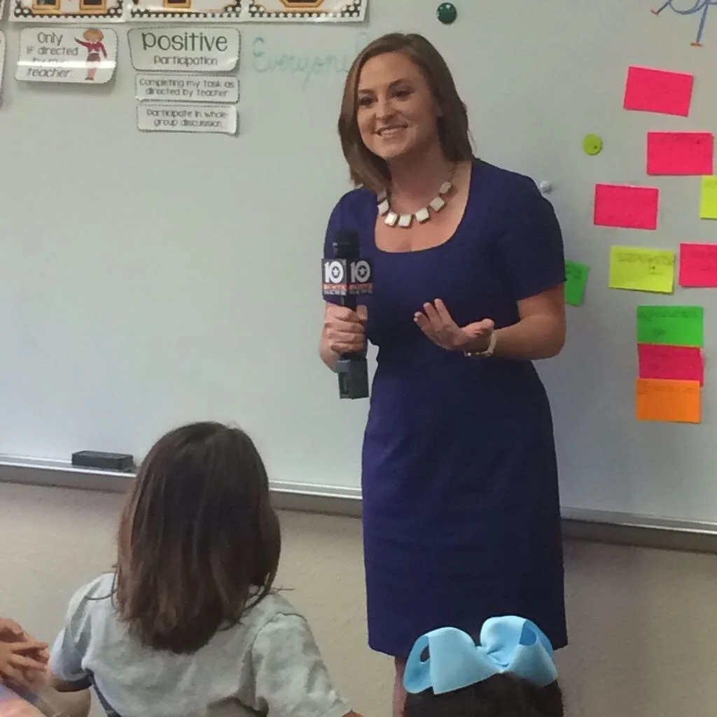 Media Specialist Bethany Moore covering a story in her previous job as a broadcast reporter.