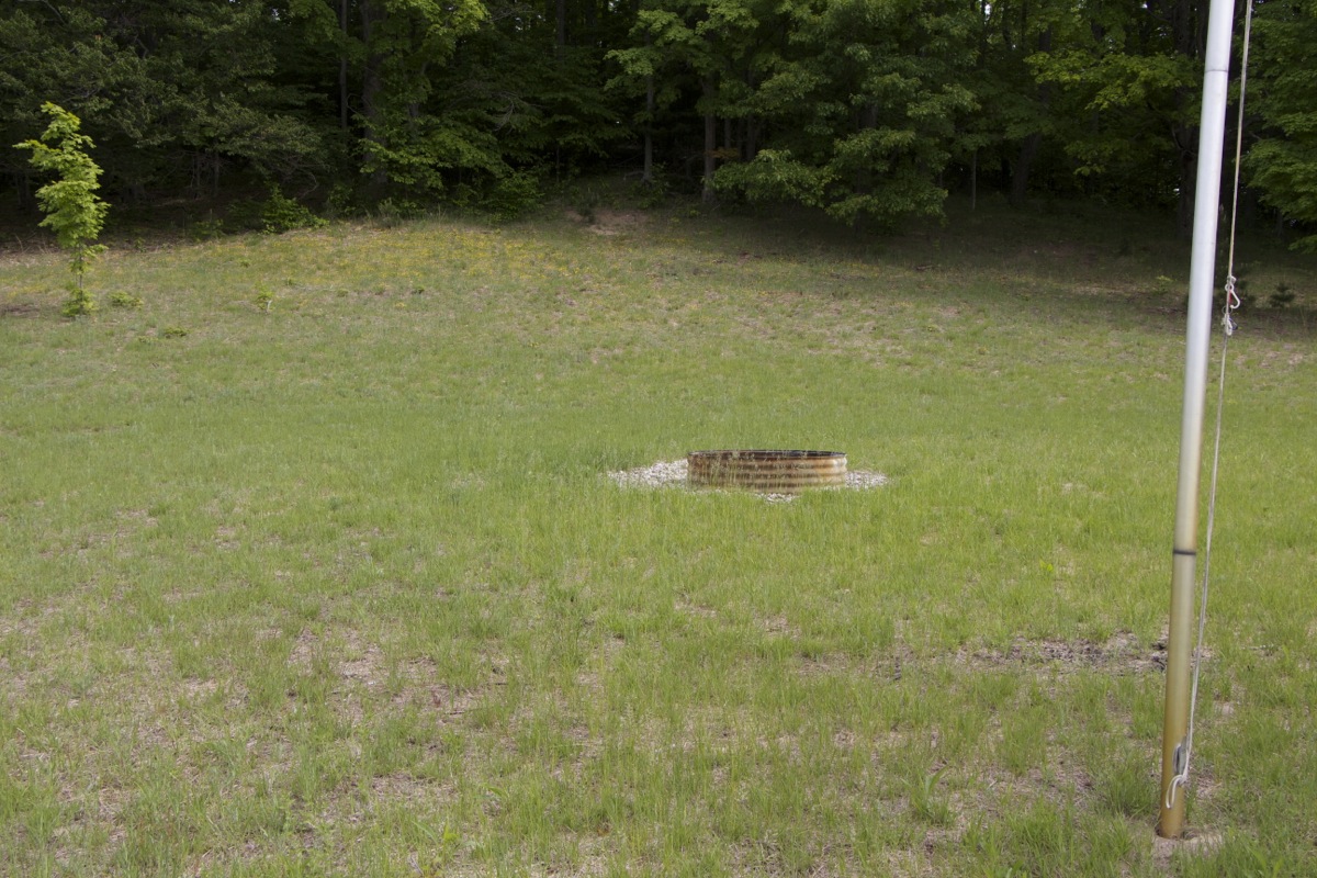 NATURAL STADIUM, FIRE PIT, AND FLAG POLE Naturally ideal for performances, flag ceremonies, awards, and large gatherings.