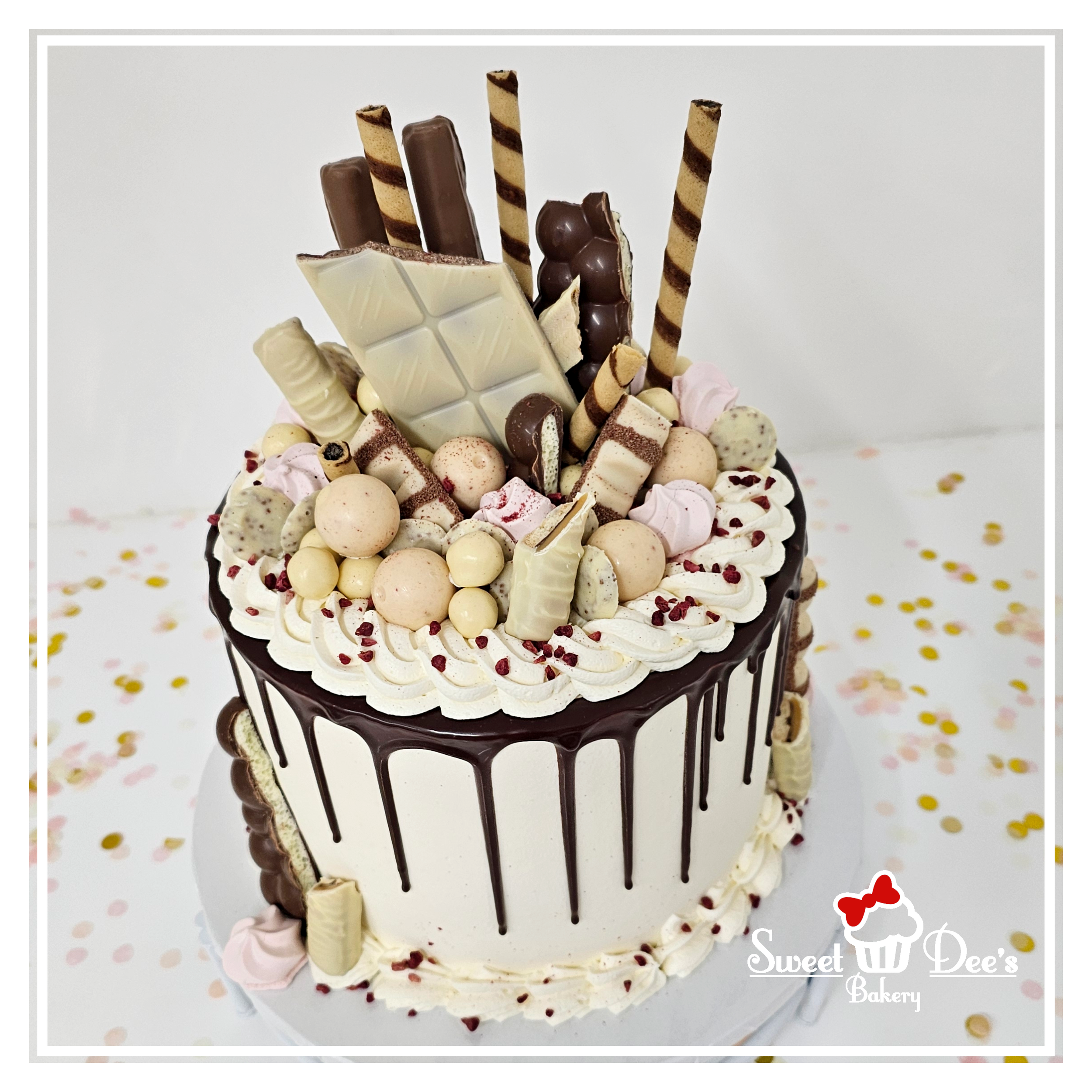 White Chocolate Overload Drip cake with Raspberry