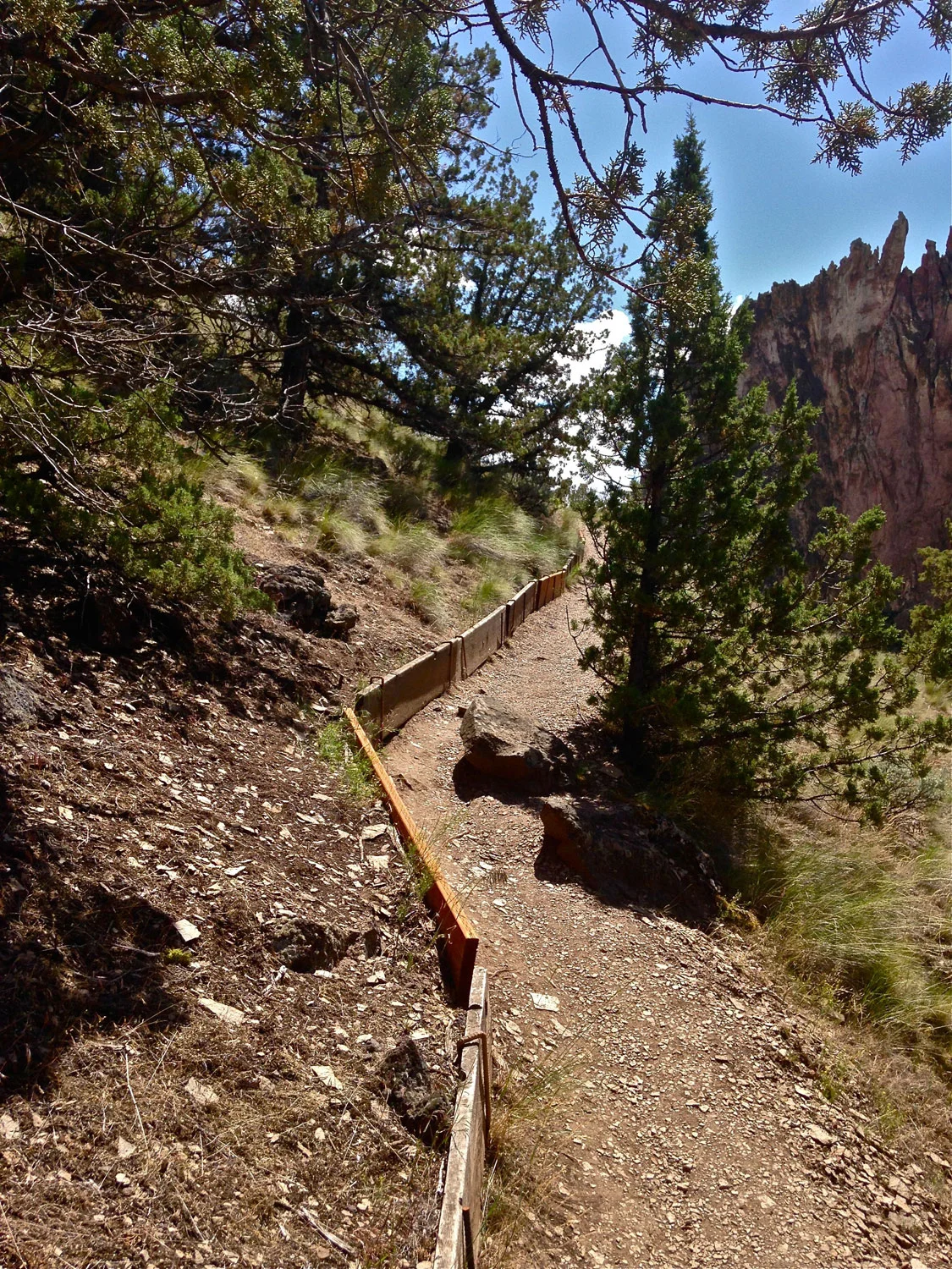 Stairs lead to a scree trail as the Rope-de-Dope Trail heads up out of the river canyon at Smith Rock State Park.