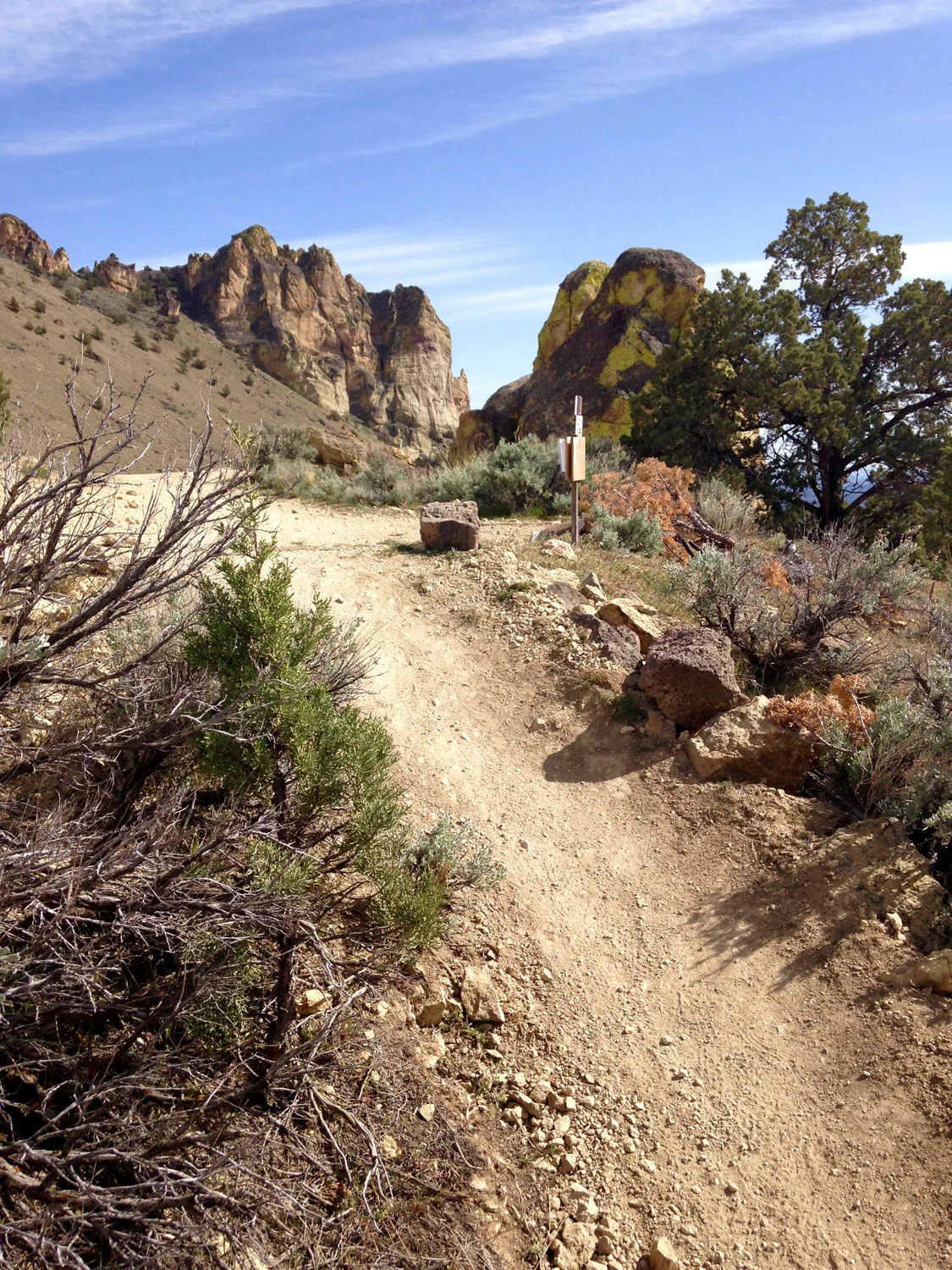 Finally the Summit Trail tops out at the summit of the Burma Road Trail. To do the Summit Trail Loop continue straight ahead and down the Burma Road back to Smith Rock State Park.