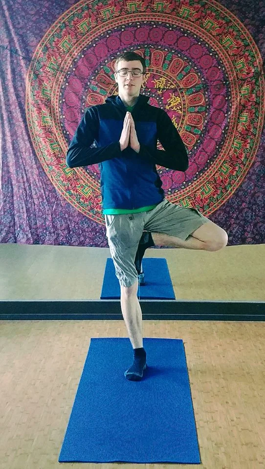 Alex teaching yoga at the Bend Rock Gym