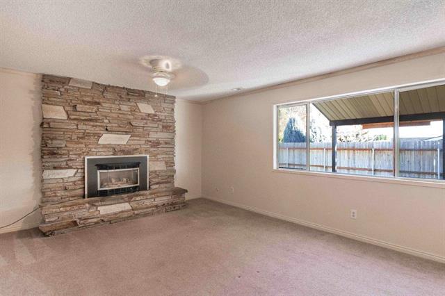 This is the den and feels a lot like the basement in this 2.5 level home. The Oakley stone fireplace fulfills all my wildest stone dreams and I can hardly wait to rip out that insert and make her wood burning again.