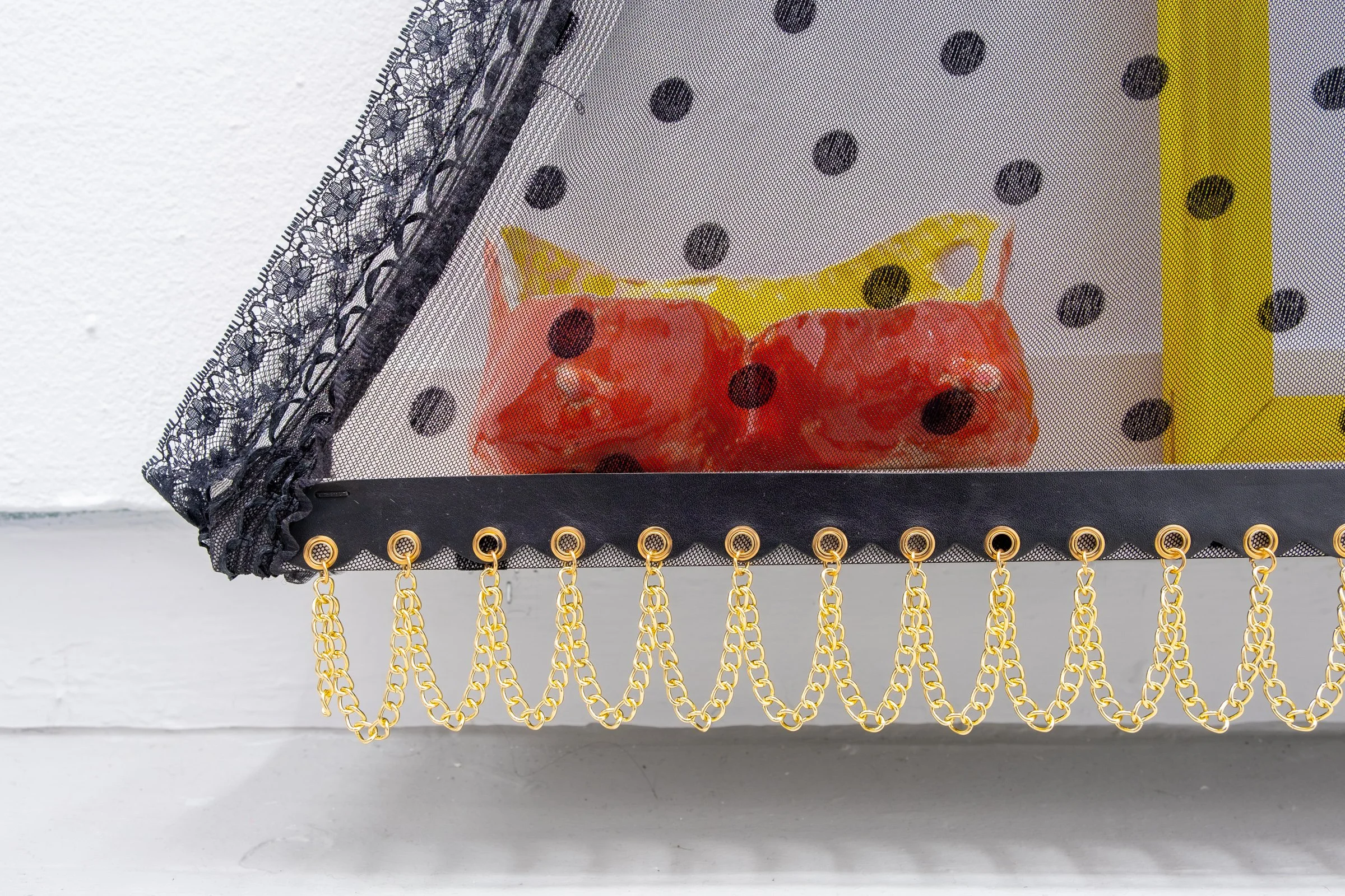   Belle De Jour for Hallway Corner                                         2025. Site-specific installation with spandex mesh, elastic trim, pleather, leather, ceramic, shelves, doorknob                                 152" x 125" x 5" 