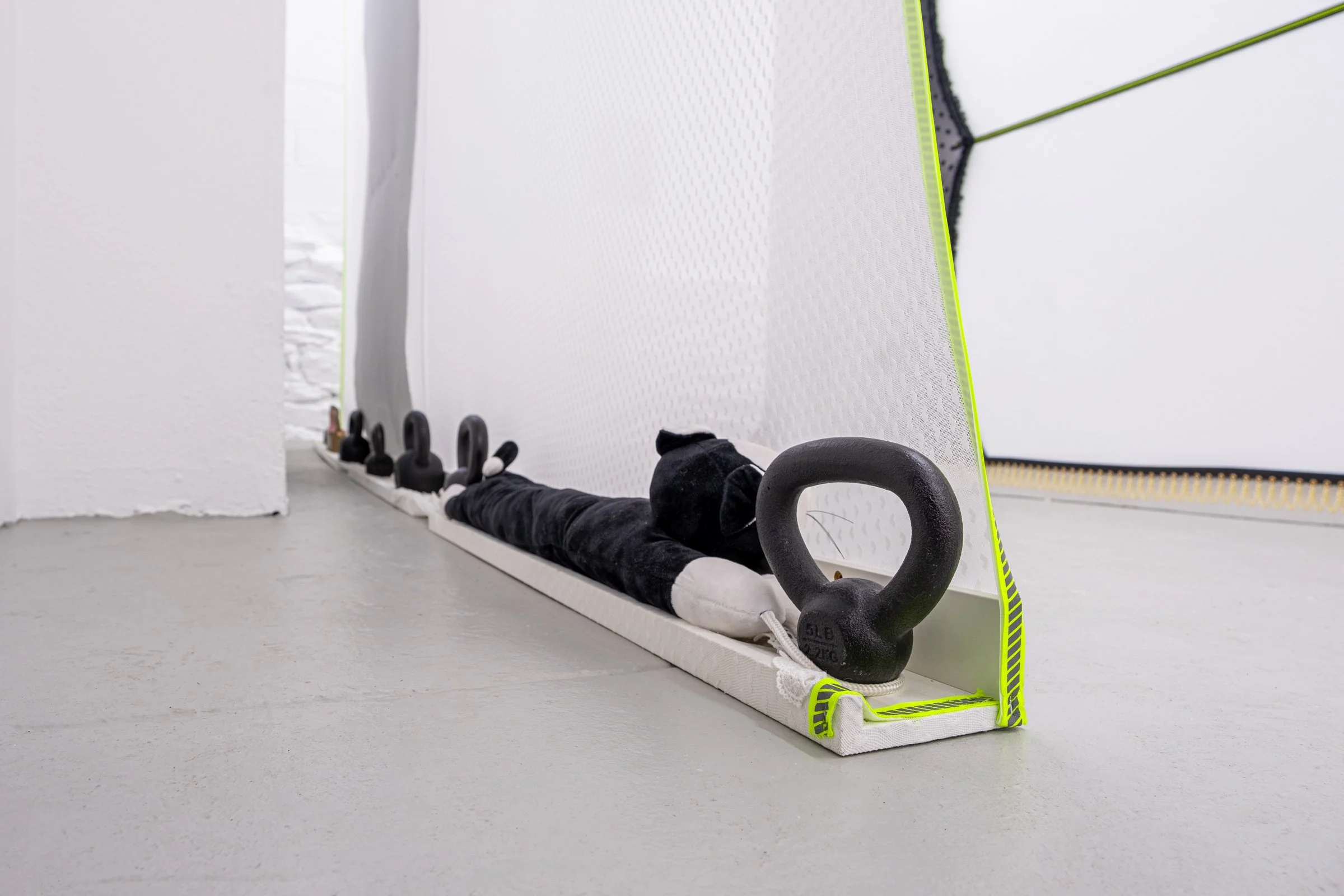   Bodice for Lyonya, Fedya, Katya and Vinny                                       2025. Site-specific installation with spandex mesh, linen, shelves, kettle bells, door draft stoppers, trim, linen thread, fabric polymer, ceramic, zip ties, oil paint,