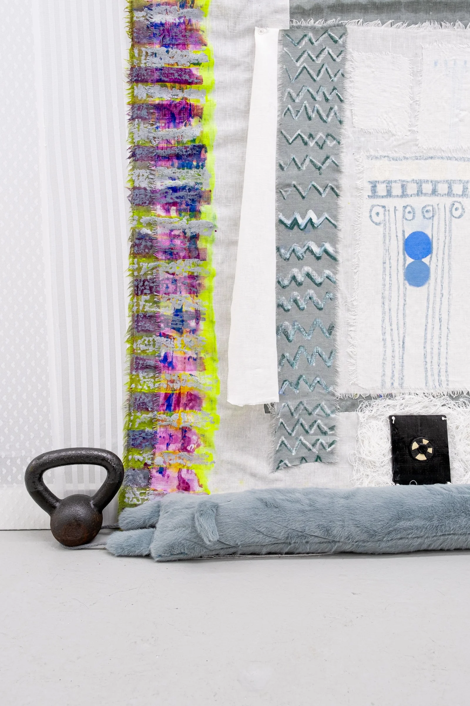   Bodice for Lyonya, Fedya, Katya and Vinny                                       2025. Site-specific installation with spandex mesh, linen, shelves, kettle bells, door draft stoppers, trim, linen thread, fabric polymer, ceramic, zip ties, oil paint,